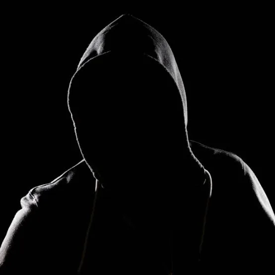 Anonymous hooded figure representing Ryan D